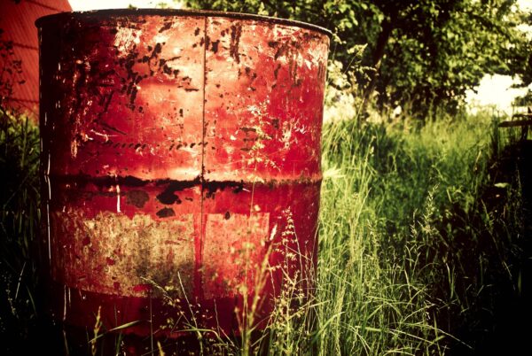 Old Red Bin In Field